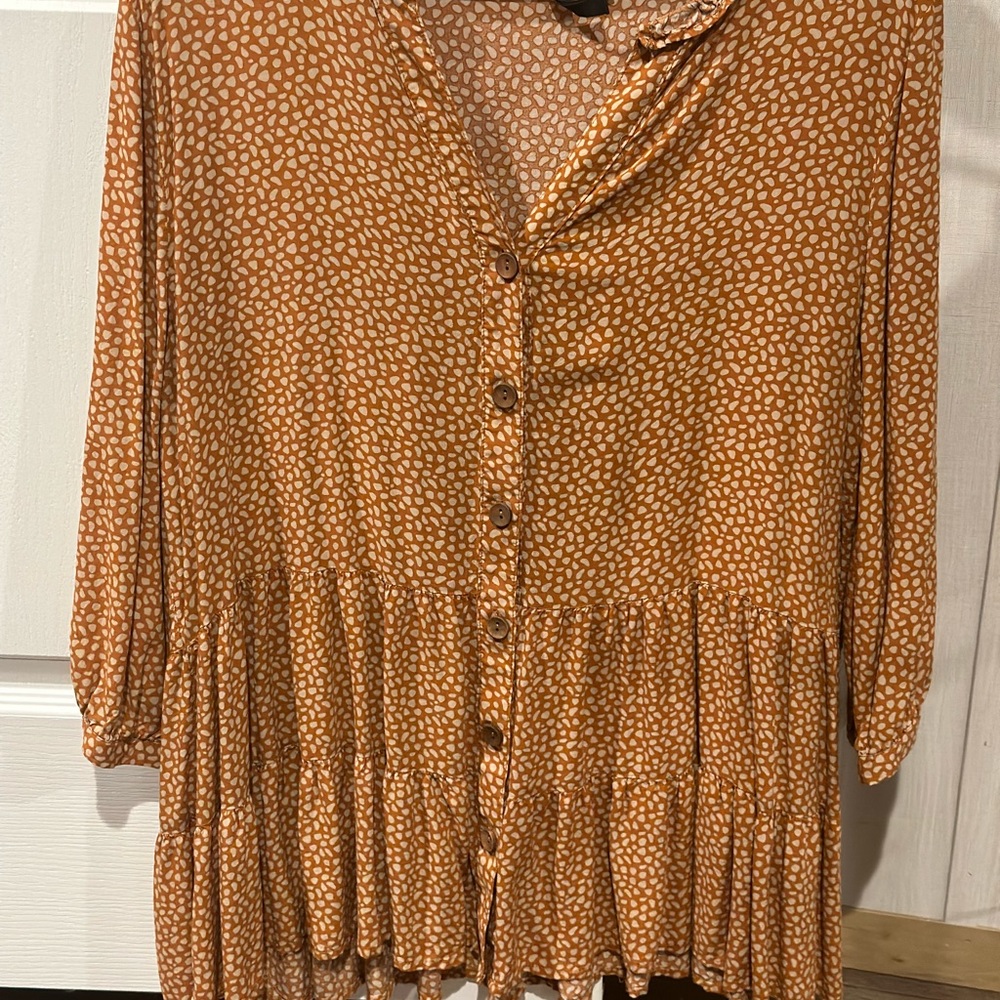 Orange and white,large, longer so would wear with leggings.